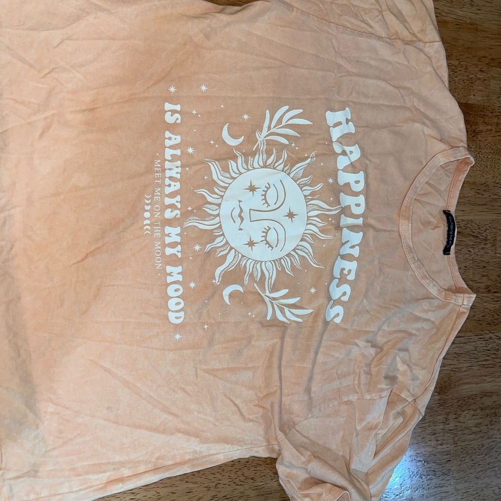 Orange Graphic Tee with Sun and Moon Design
